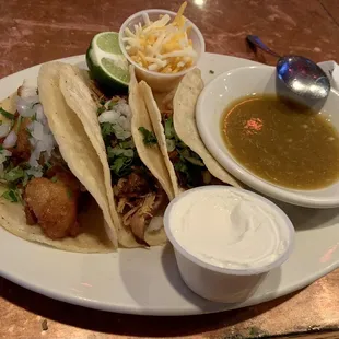 The tacos are average but the homemade salsa verde is top shelf goodness. Get the Chorizo tacos. They were the best.