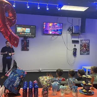 Caleb taking the boys through the instructions.