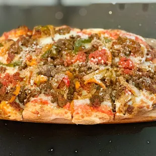 Meatballs and spicy Nduja Pinsa!! some added roasted peppers and onions. Yeah Baby!