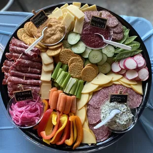 Custom charcuterie platter with boars head meats and cheeses. Using fresh veggies as fillers.