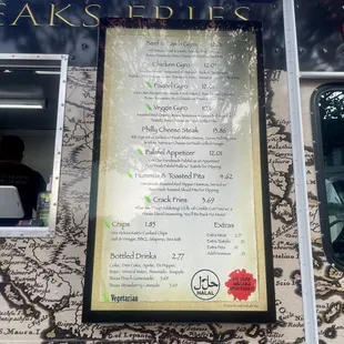 a menu on a food truck