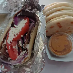 Beef and lamb gyro with a side of hummus and pita bread. So yummy!!