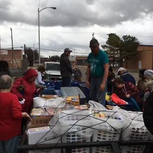 1200 pounds of food , 600 each of blankets , hats , scarves , t-shirts , pairs of socks , gloves and 100 coats.
