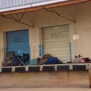 Several living on an abandoned loading dock.