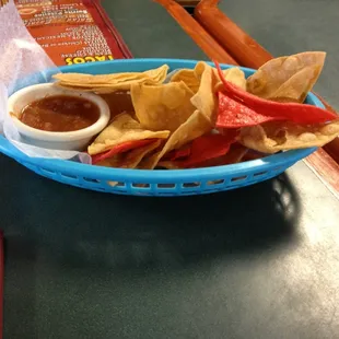 a bowl of chips and salsa