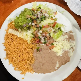 The sides to my fajitas. Alot of food! Not a bad price either!