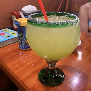 a margarita in a glass on a table