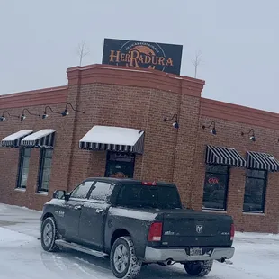 a pickup truck parked outside