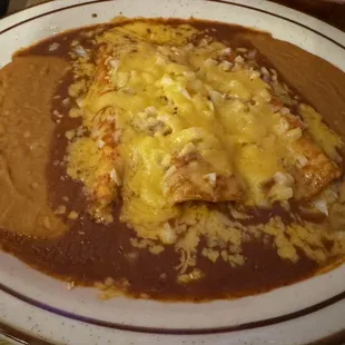 Cheese enchiladas no rice double beans. 12.1.23