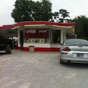 a car parked in front of a store