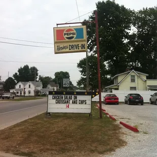 a sign for a drive - in