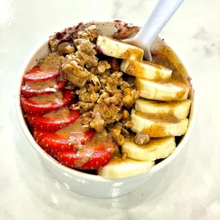 House made granola and almond butter on our smoothie bowls is over the top GOOD and good for you!