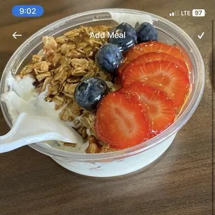 Plain yogurt, toasted granola, strawberry, blueberries, and top with a glaze of honey.