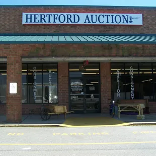 Front view of the store.   Located to the left of Food Lion Grocery Store.