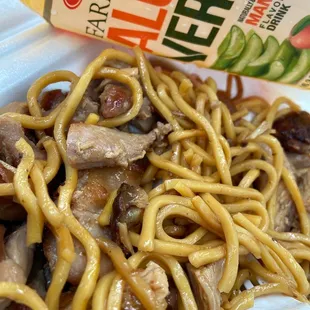 noodles and meat in a container