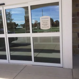 Entrance. Little sign explains that it is all together - Schowalter Villa and Hesston Bakery &amp; Cafe. Hesston College is in walking distance.