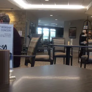 Peeking across hall between Schowalter Villa Reception (just out of sight on left side) and HB&amp;C on right is another dining area. Overflow?