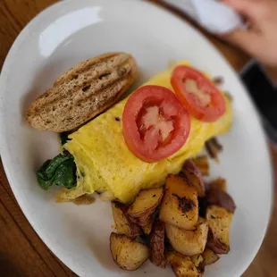 an omelet and potatoes