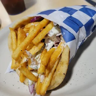 Chicken Gyro just like in Greece with extra crispy fries and homemade tzatziki.  So delicious!