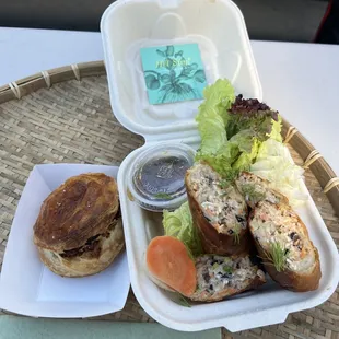 Crab and Chicken egg roll garnished with fresh bill with a home made small batch jalapeño artisan vinegar fish sauce.