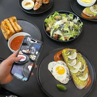 Avocado Tartine w/egg, Bonito Ceasar Salad, Kim-Cheese sandwich, Fried Chicken