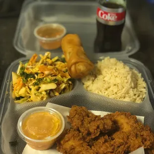 Chicken Platter: Fried Chicken with a yummy dipping sauce, peanut salad, ginger rice and an egg roll appetizer