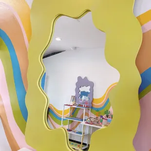 We carry handmade organic shape mirrors!