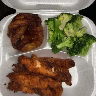 a meal in a styrofoam container