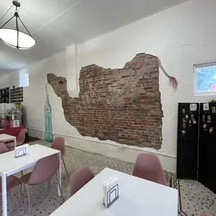 Sitting area and exposed brick wall