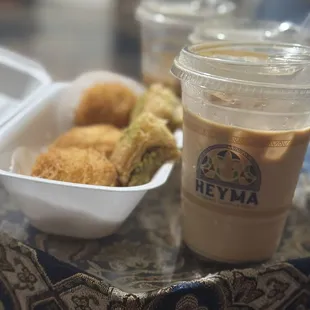 a cup of coffee and a sandwich