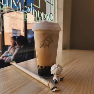 A soccer babo with the bobo (milk tea)