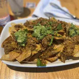 CHICKEN NACHOS with vegan queso