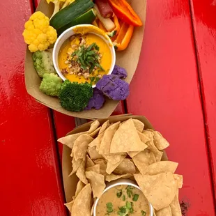 Smoky Carrot Hummus and Chips &amp; Queso (vegan) appetizers