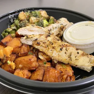 BUILD YOUR OWN BOWL - grilled chicken breast, small honey garlic brussels sprouts, sweet potato hash, and garlic aioli