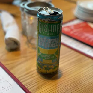 a can of beer on a table