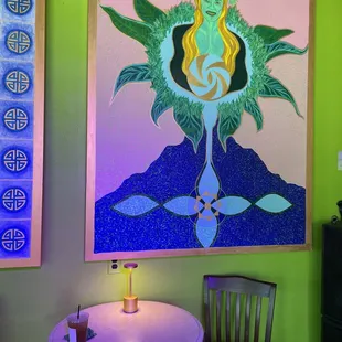 a table and chairs in a brightly lit room