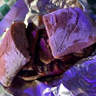 a close up of a sandwich with meat