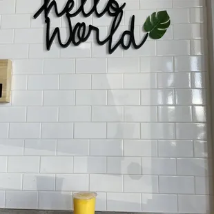 a glass of juice on a table