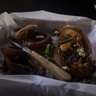 Black burnt chicken and black burnt onion rings. ‍