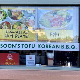 a sign in the window of a restaurant