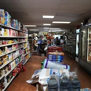 a grocery store aisle filled with products