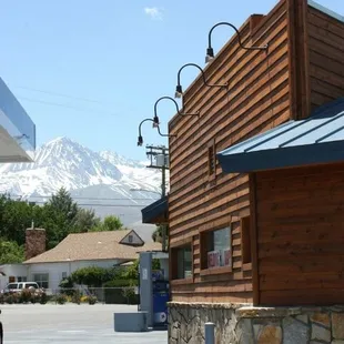 a gas station with a mountain in the background