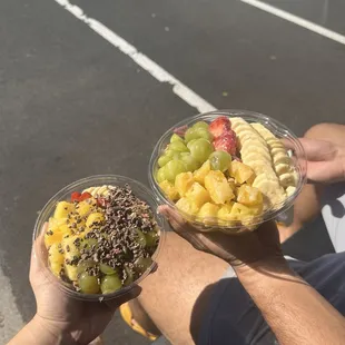 Medium acai bowl on the left and large acai bowl on the right.