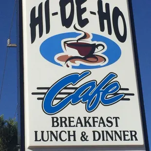 ows a sign for a restaurant