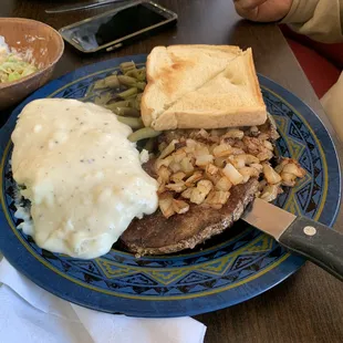 Liver and onions with toast mashed potatoes and green beans