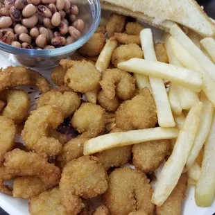 Popcorn shrimp, French fries and black eyes peas