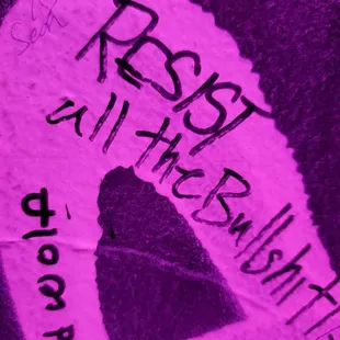 graffiti on a wall in a dark room