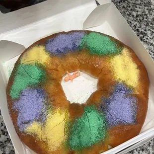 Hi-do&apos;s cream cheese filled king cake. No icing but way too much sugar crystals.