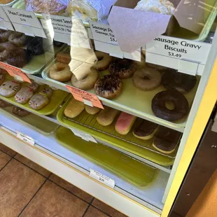 a display of various types of donuts