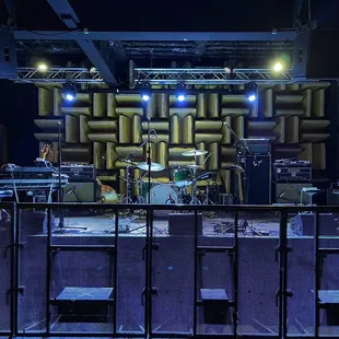a stage with a drum set up